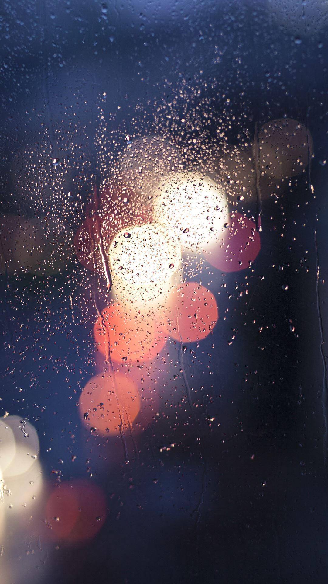 Drops of Rain on Glass